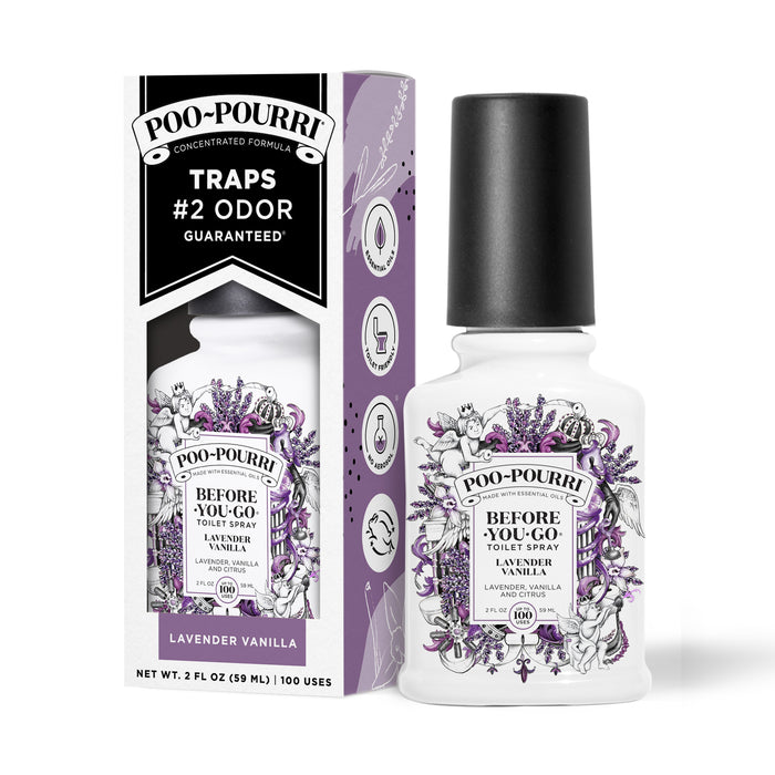 A ~Poo-Pourri “Before You Go” toilet spray in the Lavender Vanilla scent is displayed alongside its packaging against a white background. The bottle features an ornate label with cherubs, vines, and lavender elements. The packaging highlights key product benefits, including its ability to trap odors, the use of essential oils, and the absence of aerosols. The scent is described as a blend of lavender, vanilla, and citrus. The bottle contains 2 fl oz (59 ml) for up to 100 uses.