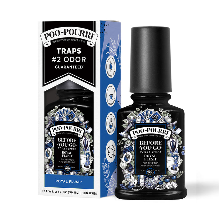 A ~Poo-Pourri “Before You Go” toilet spray in the Royal Flush scent is displayed alongside its packaging against a white background. The bottle features an ornate label with tuxedos, toilet paper, cards, and dice. The packaging highlights key product benefits, including its ability to trap odors, the use of essential oils, and the absence of aerosols. The scent is described as a blend of eucalyptus and spearmint. The bottle contains 2 fl oz (59 ml) for up to 100 uses.