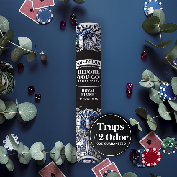 A vibrant product image of Poo-Pourri “Before You Go” toilet spray in the “Royal Flush” scent. The spray bottle is centrally placed against a dark blue background, surrounded by poker chips, cards, dice, and eucalyptus. A black circular label highlights the product’s promise to “Trap #2 Odor 100% Guaranteed”.