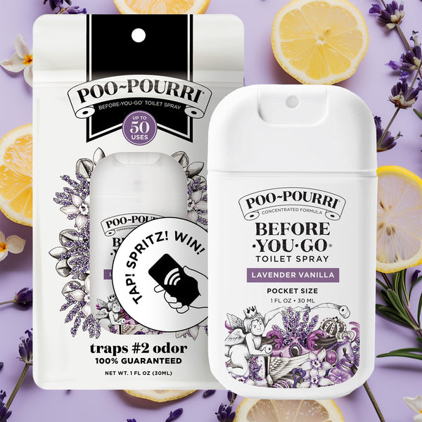 A Poo-Pourri Before-You-Go Toilet Spray in Lavender Vanilla scent, displayed with vibrant background elements of fresh lemons and lavender. The white pocket-size bottle has black and purple label details, and the packaging behind it includes lavender, cherub, and toilet paper illustrations and product benefits. A circular sticker on the front highlights a ‘Tap! Spritz! Win!’ feature.