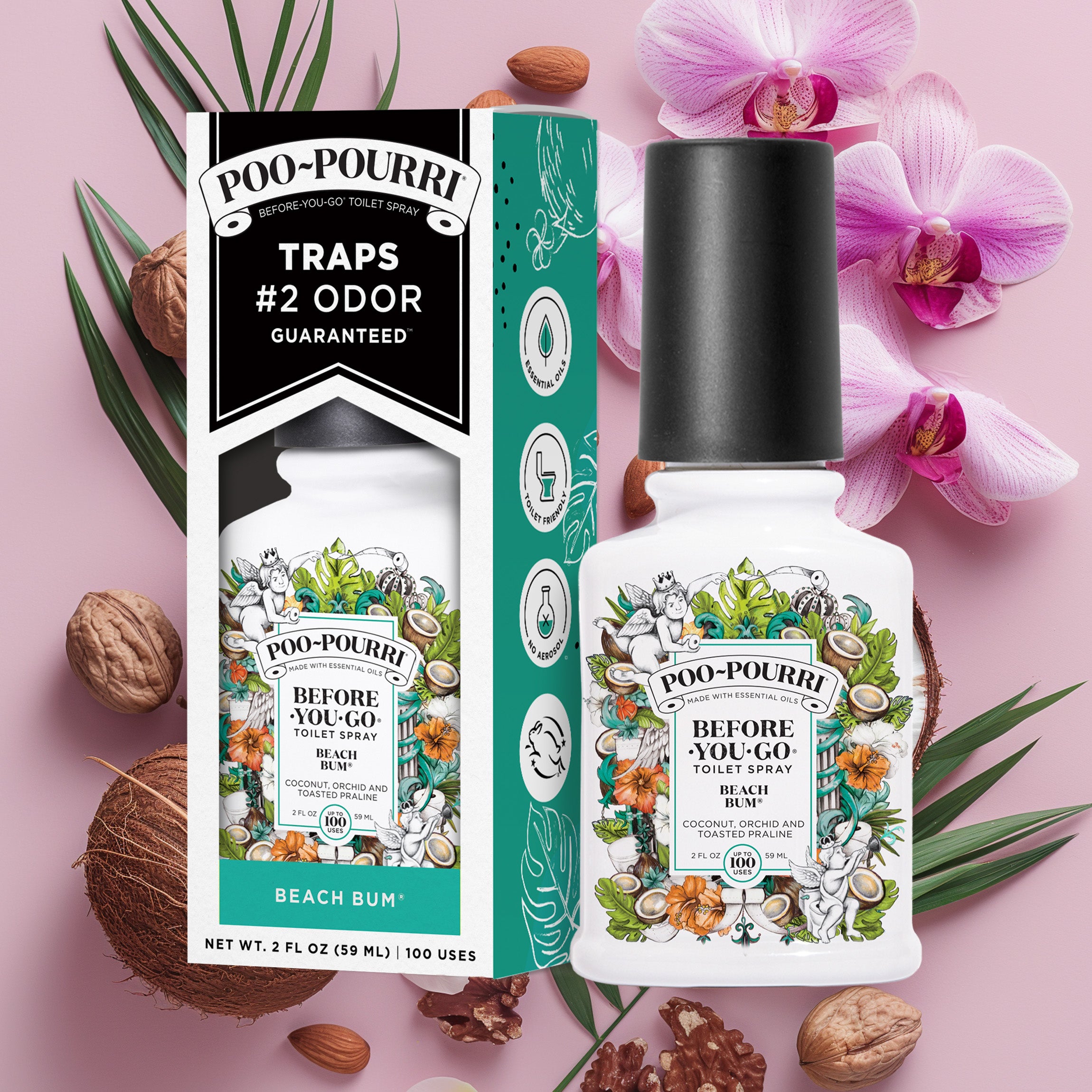 A ~Poo-Pourri “Before You Go” toilet spray in the Beach Bum scent is displayed alongside its packaging against a decorative pink background, featuring coconuts and pink flowers. The bottle and box have an intricate design with cherubs, toilet paper, and coconut elements, highlighting the ingredients. The packaging emphasizes the product’s ability to trap odors before they start, with key details such as “100 Uses,” “No Aerosols,” and “Essential Oils” visible.