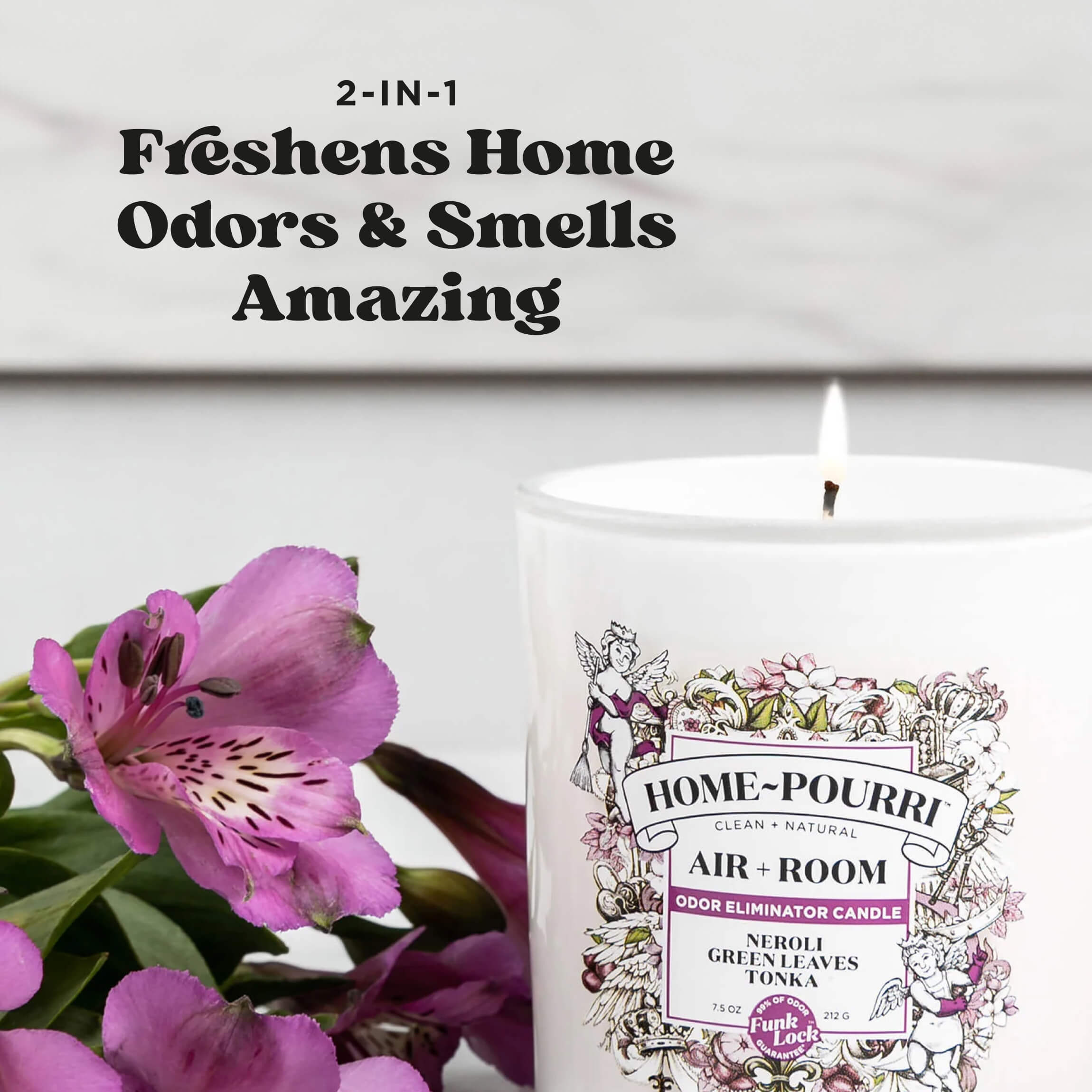 HOME~Pourri Air + Room Odor  Candle with Neroli, Green Leaves & Tonka, lit beside purple flowers—freshens odors and fills your space with clean, natural fragrance.