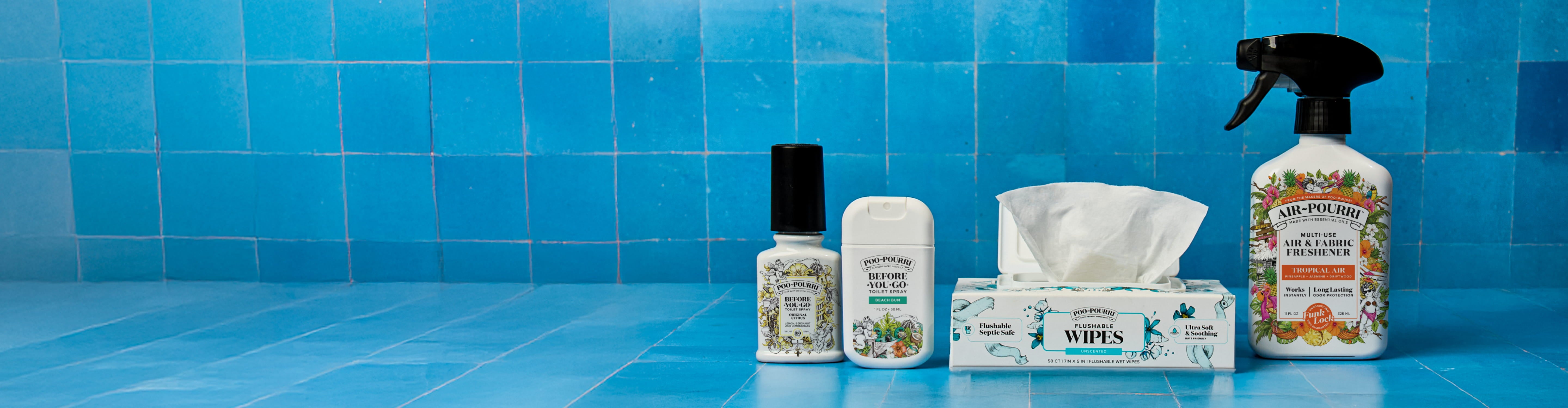 Collection of ~Pourri products on a blue tiled background
