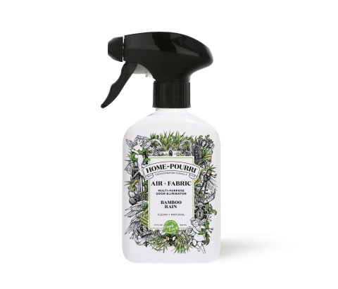 Home-Pourri Bamboo Rain Air + Fabric Spray in a white bottle with a black spray nozzle, featuring botanical illustrations on the label.