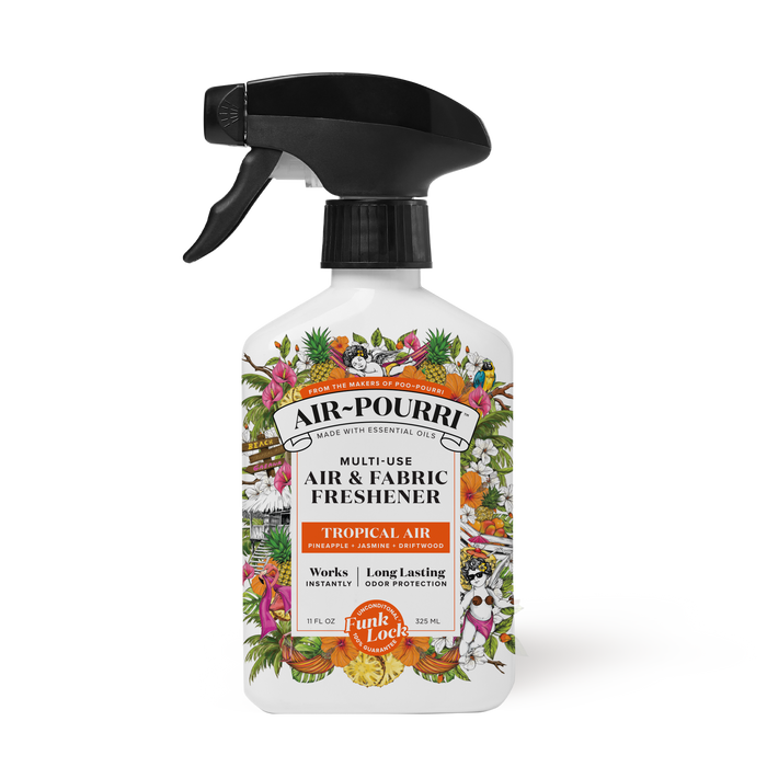 The ~Pourri Tropical Air - Home~Pourri Room Spray features a spray bottle with a pineapple and tropical plant design. Infused with essential oils, it offers a fresh and clean formula to freshen home odors.