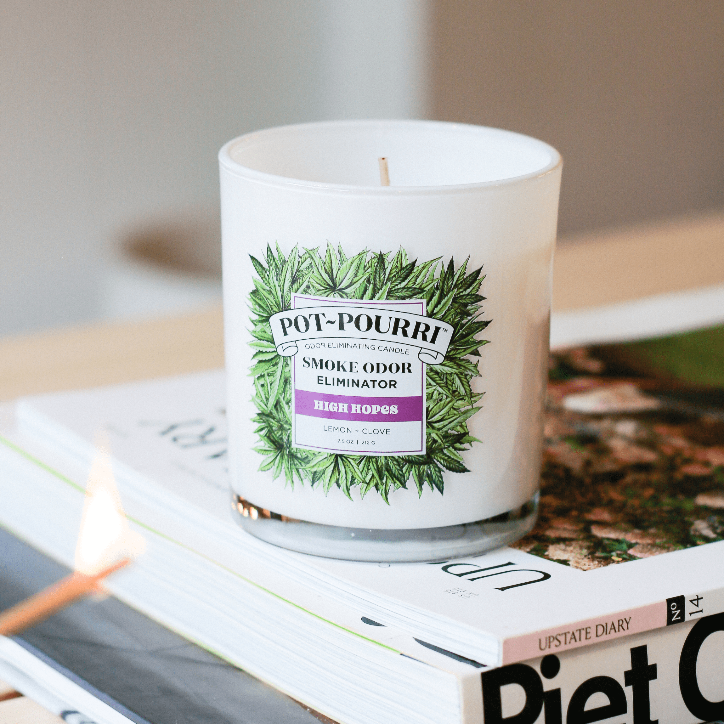 Odor clearance eliminating candles